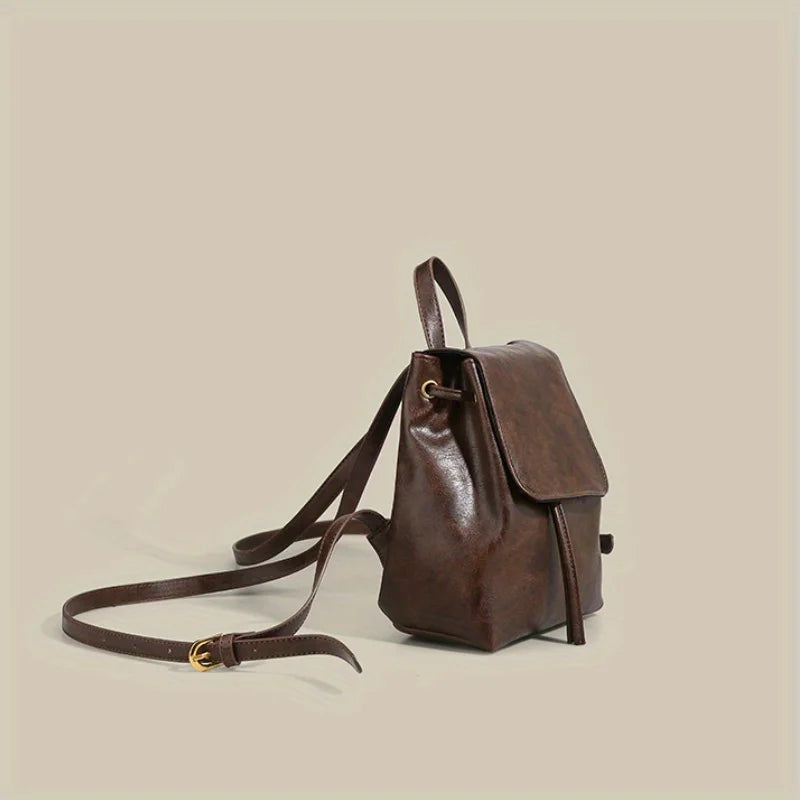 Abbey Drawstring Flap Backpack