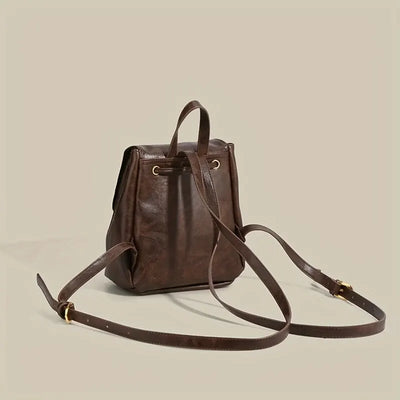 Abbey Drawstring Flap Backpack