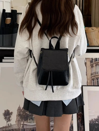 Abbey Drawstring Flap Backpack